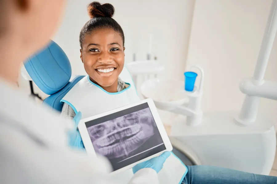Patient reviewing dental images with a dental professional